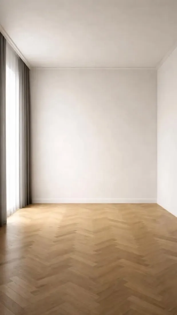 The empty test room: white walls, a tall window and a herringbone wood floor